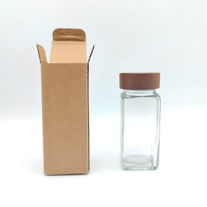 Square 120ml glass spice jar with acacia wood lid and protective cardboard packaging