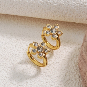 Elegant gold flower hoop earrings with sparkling clear crystals and detailed petals
