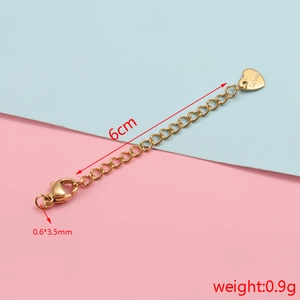 Detailed view of 6cm golden stainless steel extension chain with lobster clasp and weight specs