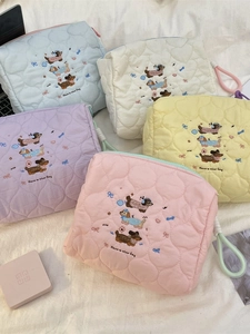Quilted heart pattern makeup bag with dachshund embroidery in five pastel colors