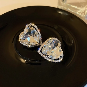 Elegant silver heart-shaped clip-on earrings with sparkling crystal rhinestones for women