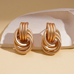 Chic multilayer geometric circular earrings in matte gold finish with a vintage style
