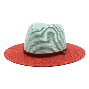 Two-tone woven Panama straw hat with green crown, red brim and brown velvet band