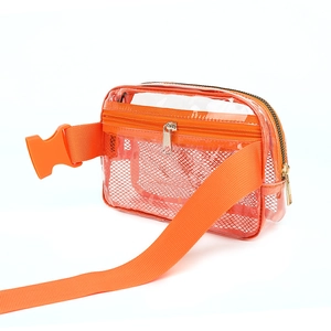 Close-up of vibrant orange transparent PVC waist bag with mesh pocket and strap