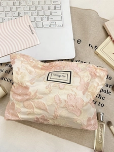 Exquisite floral jacquard makeup bag with Pleasant Time label in soft cream and pink