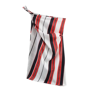 Chic red and black striped asymmetrical top and skirt set in silky fabric with neck tie