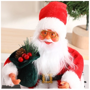 Dettaglio statuina di Babbo Natale con occhiali dorati e sacco di regali