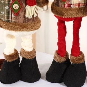 Standing Christmas doll with retractable legs and black felt boots for holiday decoration