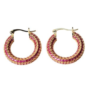 Elegant gold round hoop earrings with pavé red gemstones shown on a white background