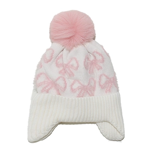 White knit beanie with pink pom-pom and bow patterns, featuring warm ear protection flaps