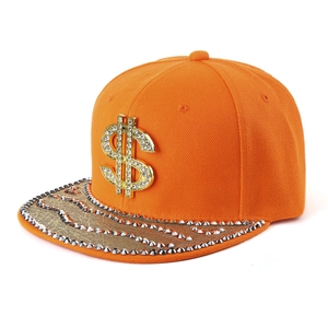Hip hop snapback hat in orange with a gold dollar sign and silver spiked rivets