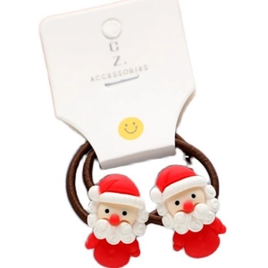 Pair of Christmas Santa Claus hair ties for kids with brown elastic bands on a display card