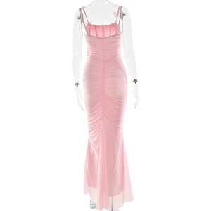 Detailed back view of pink pleated camisole dress with fish tail hem on a clear mannequin