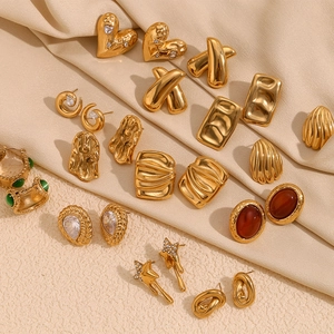 Vintage 18K gold plated stainless steel geometric earrings set on beige silk