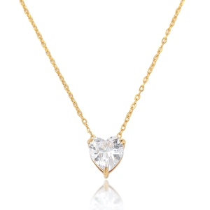Detail of elegant gold necklace featuring a sparkling heart-shaped clear zircon pendant
