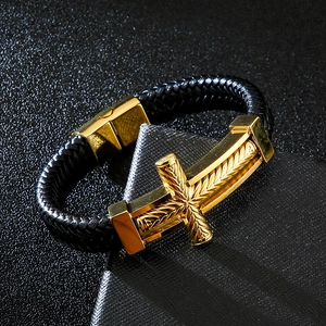 Men's punk braided black leather bracelet featuring a gold cross and magnetic clasp