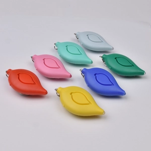 Close-up of colorful leaf-shaped personal alarms in various vibrant silicone finishes