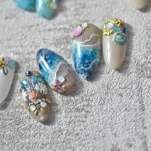 Adesivi per nail art 3D a tema oceano con onde blu, conchiglie e stelle marine
