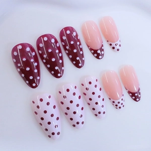 Classic French dot almond press-on nails in burgundy and pale pink finish