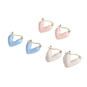 Three pairs of heart hoop earrings in pearlescent blue, soft pink, and cream white colors
