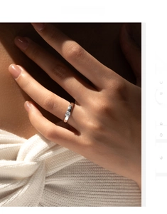 Detailed macro view of a 925 sterling silver ring featuring a sparkling moissanite stone