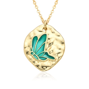 Gold coin pendant necklace featuring a vintage hammered texture and a teal butterfly inlay