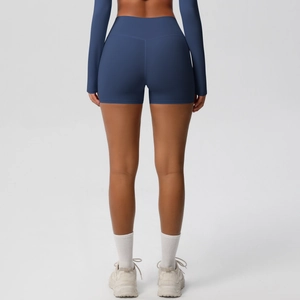 Rear view of high-waisted deep blue yoga shorts with scrunch butt lifting effect