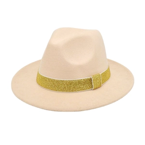 Detail of wool fedora hat with elegant gold glitter ribbon trim on a clean white background