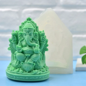 Ganesha silicone mold kit for DIY soap and candle making with mint green elephant statue