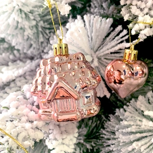 Rose gold electroplated Christmas tree ornaments in house and heart shapes with snow