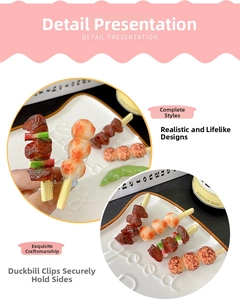 Detail of realistic BBQ meat skewer hair clip with secure metal duckbill clip design