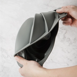Flexible grey silicone cake mold showing high elasticity for easy chiffon cake release