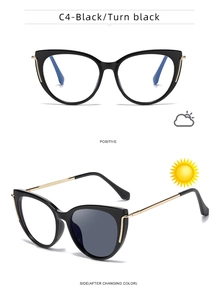Cat eye photochromic sunglasses with black frames and gold metal temples detail