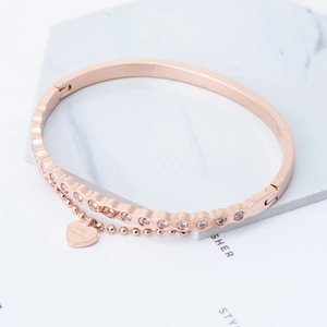 Rose gold heart bangle with LOVE FOREVER engraving and pave cubic zirconia accents