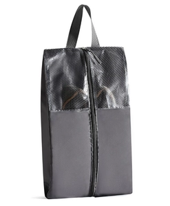 Detail of waterproof travel shoe bag with breathable mesh and sturdy carry handle