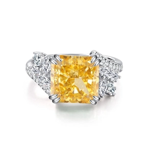 Elegant S925 silver ring featuring a radiant cut yellow gemstone with halo diamonds
