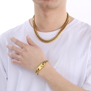Polished gold double-weave Cuban link chain necklace and bracelet set for men