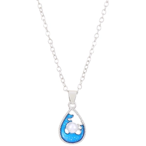 Close-up of silver water-drop pendant with blue enamel wave and white pearl detail