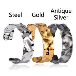 Polished wide hammered texture cuff bracelet in steel, gold, and antique silver finishes