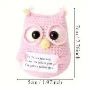 Detail view of pink crochet owl doll with dimensions 7cm height and 5cm width