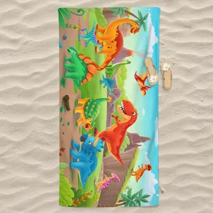 Microfiber beach towel with colorful 3D cartoon dinosaur print on a sandy beach