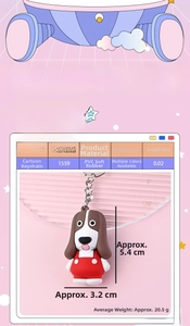 Detail view of cartoon dog PVC keychain showing product dimensions 5.4cm x 3.2cm