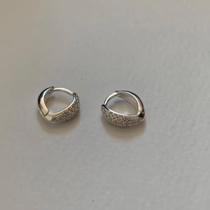 Elegant 925 sterling silver huggie earrings with pavé set white zircon for daily wear