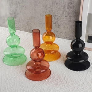 Colorful borosilicate glass candle holders in spherical minimalist stack design