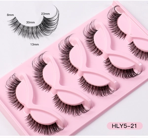 Detail showing 5 pairs of fox-eye false eyelashes with clear bands and length dimensions