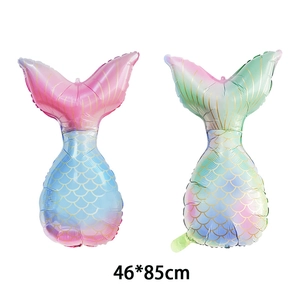 Detailed view of 46x85cm mermaid tail foil balloons with scale pattern for party decor