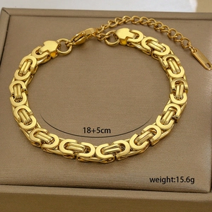 Detailed view of 18K gold-plated titanium steel bracelet with 18+5cm size label