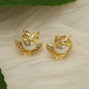 Chic golden owl stud earrings with white imitation pearls and sparkling crystal rhinestones