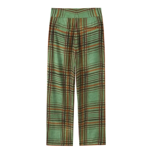 Detailed view of green and reddish brown plaid pattern on high-waisted trousers