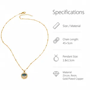 Detail showing 18k gold plated evil eye pendant with blue resin and white zircon pavé